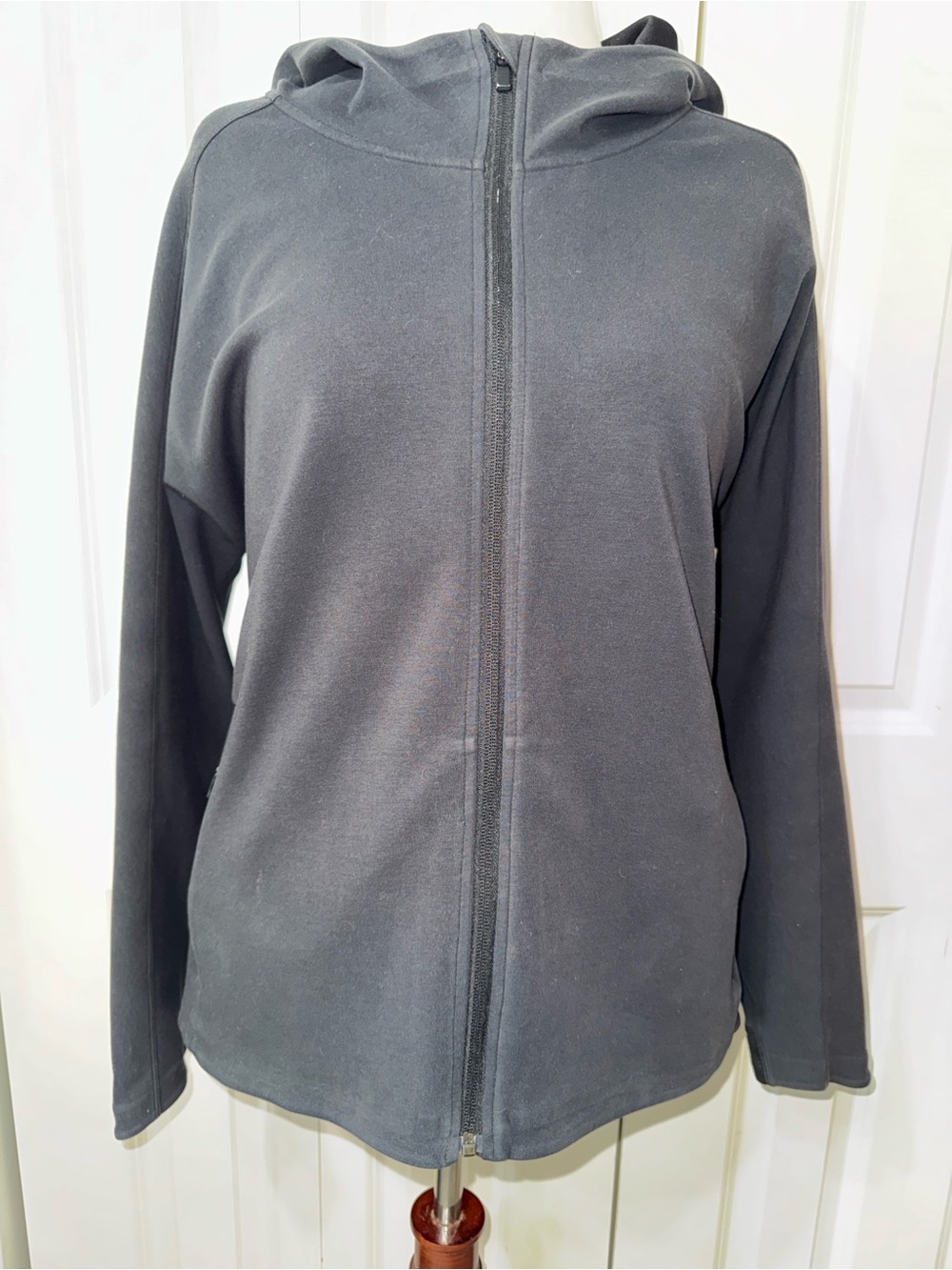Black Hooded Jacket. Perfect weight to wear over sweatshirts.